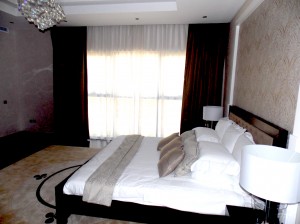 Curtains with net, wallpaper,  bed throw and carpet of Bed Room - Dubai Al barsha Villa Project