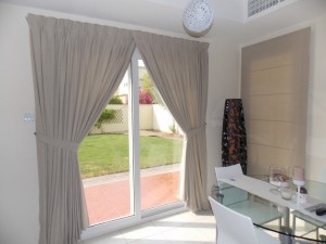 American Curtains & Roman blinds of Living Area in Spring Dubai.       