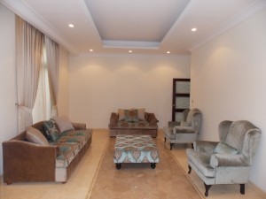 Curtain,Sofas, Chairs & Middle Table of Hall in Palm Jumeirah Dubai    