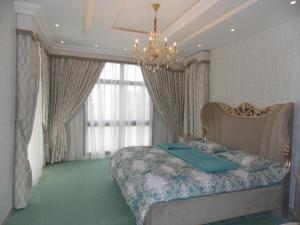 Curtains, Sheers with Pelmet,Carpet & Wallpaper of Bedroom in Fujairah villa Project