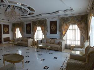 Curtains & Sheers with Design & Sofas of Up Hall in Al Quoz Villa, Dubai 