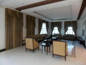 Curtains with Design & Sofas of Living Area in Al Quoz Villa, Dubai