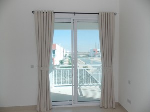 Eyelets-Curtains-of-Living-Room-in-Meydan-Heights-villa-Dubai