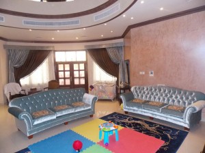 Sofa-and-Curtains-of-Living-area-in-Al-Barsha-villa              